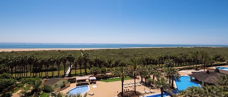 Indoor pool, pool umbrellas, pool loungers