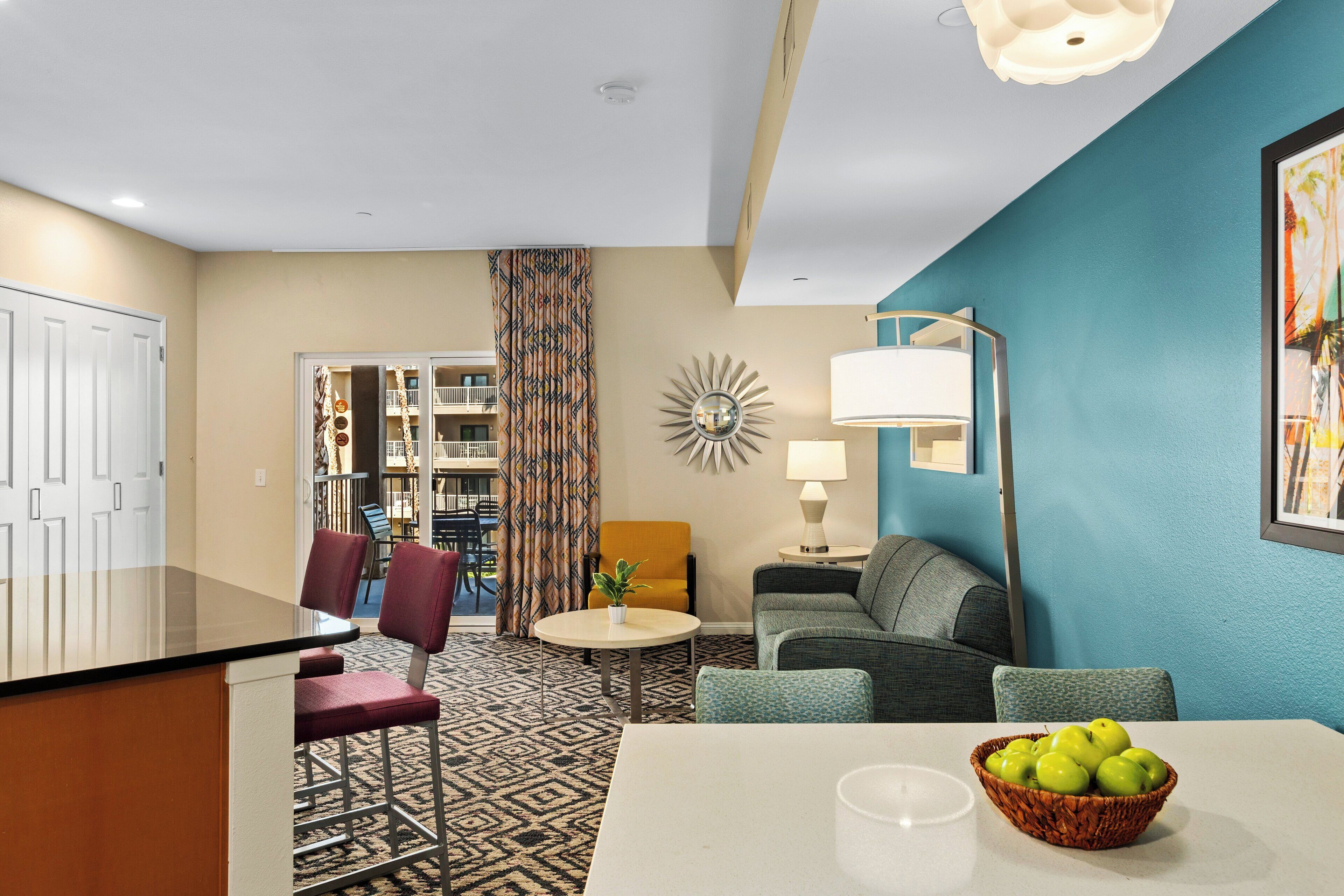 deluxe condo, 1 bedroom, non smoking, courtyard view | living area | 27-inch lcd tv with cable channels, tv