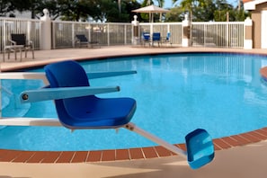 Outdoor pool, open 7:00 AM to 7:00 PM, pool umbrellas, pool loungers