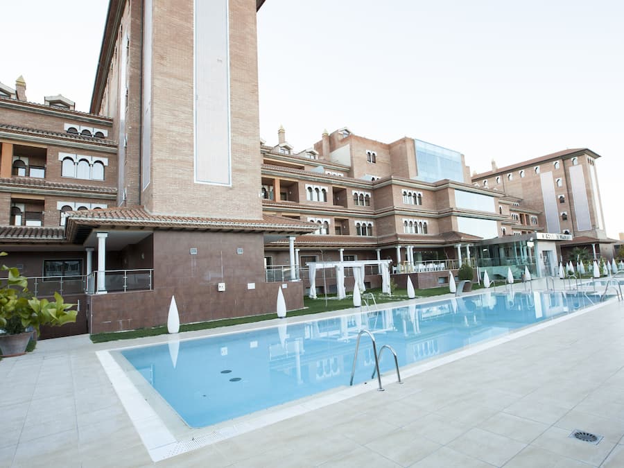 Seasonal outdoor pool, open 11:00 AM to 8:30 PM, pool umbrellas