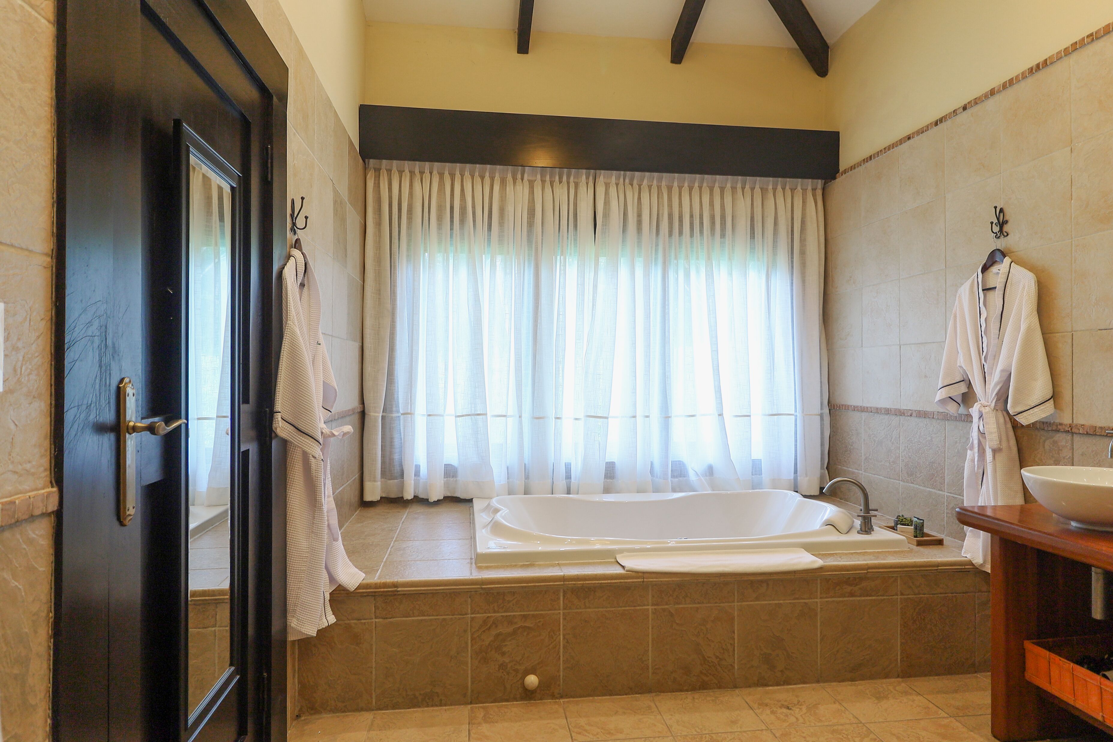 suite (master) | bathroom | hair dryer, bathrobes, slippers, towels