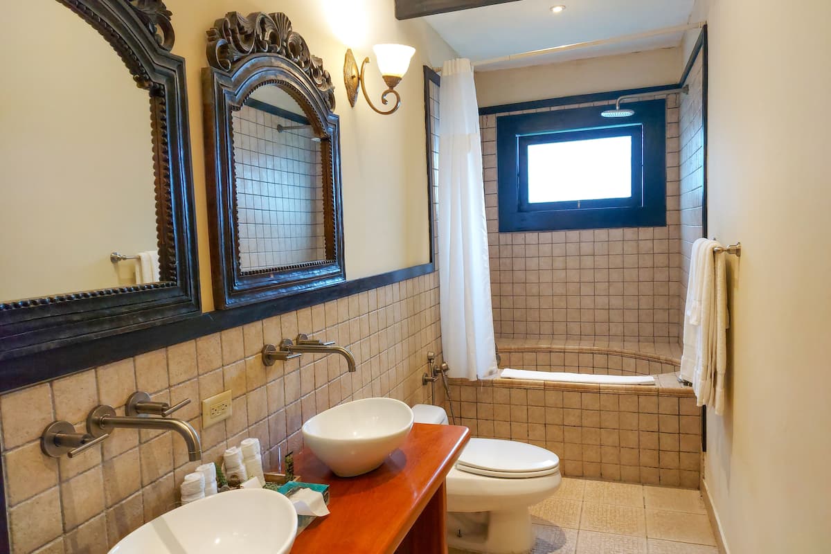 suite (loft) | bathroom | hair dryer, bathrobes, slippers, towels