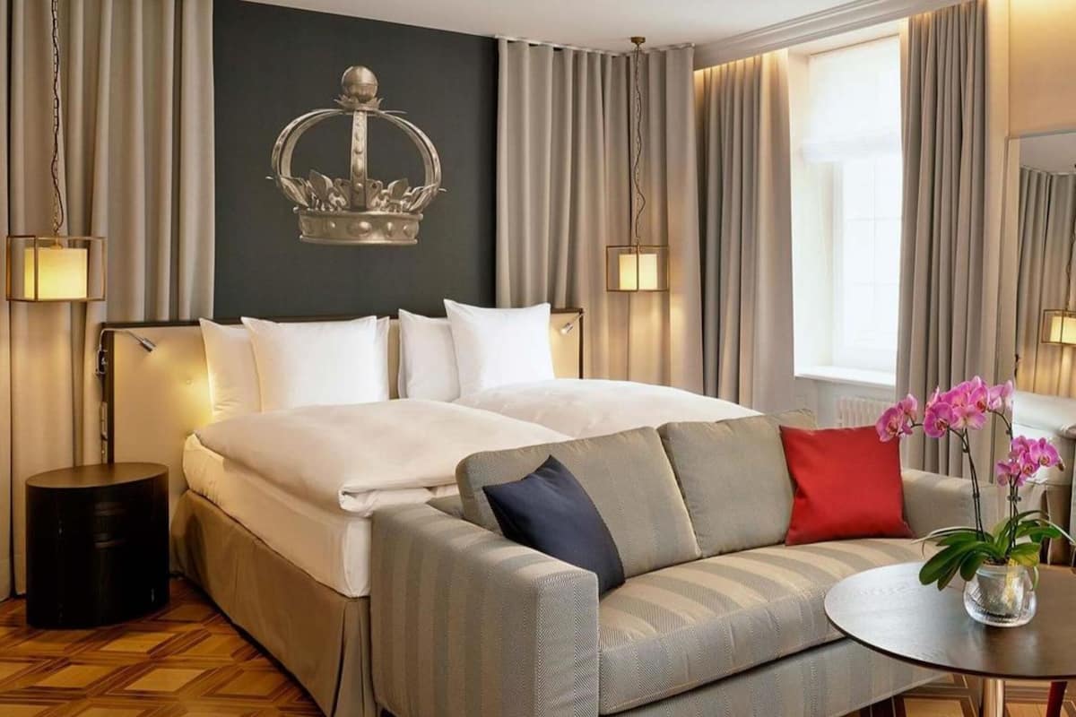 Hypo-allergenic bedding available, down comforters, minibar