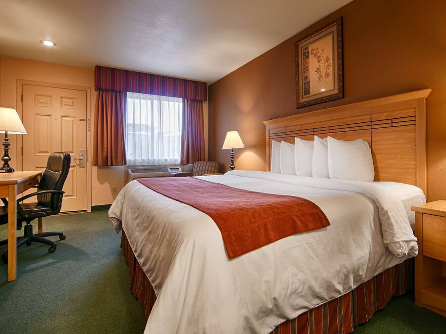 Down duvets, pillow-top beds, in-room safe, desk