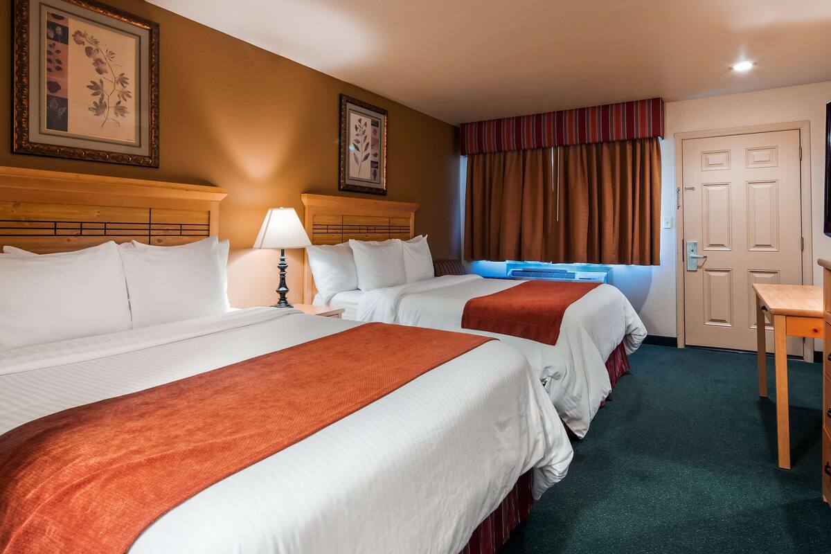 down duvets, pillow-top beds, in-room safe, desk