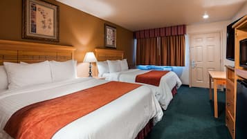 Down duvets, pillow-top beds, in-room safe, desk