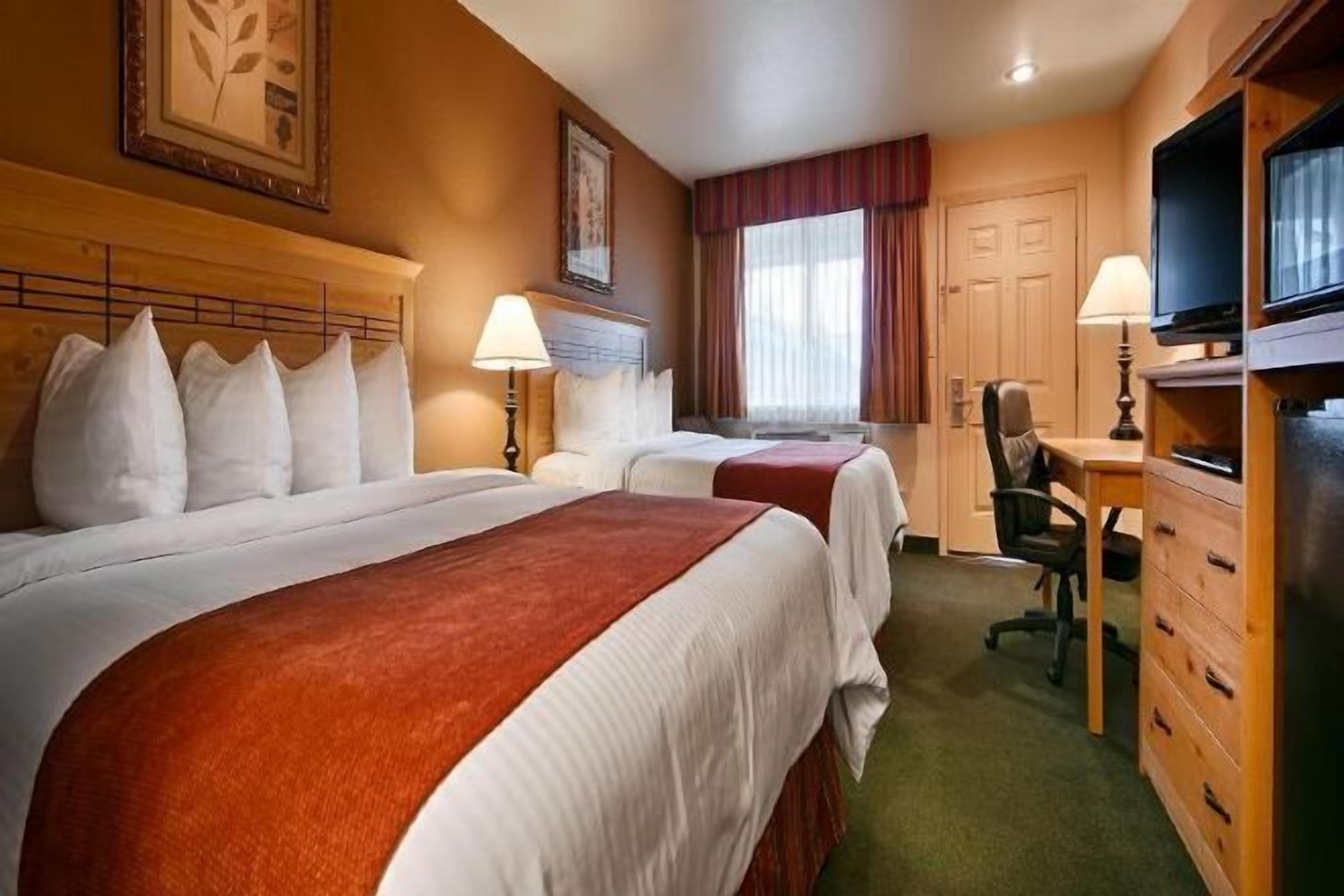 Edredón, camas con pillow-top y caja de seguridad en la habitación 