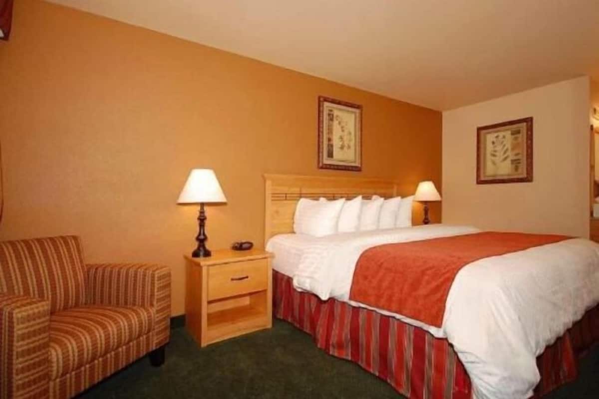 Down duvets, pillow-top beds, in-room safe, desk