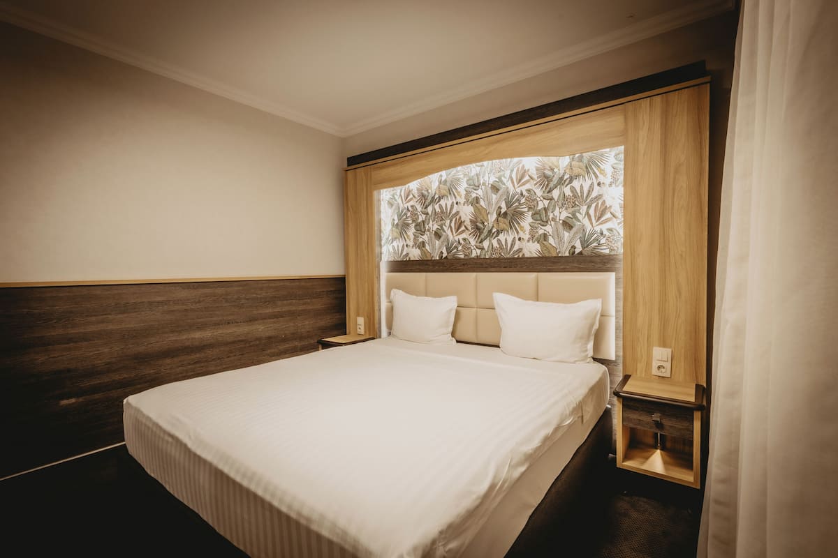 Apartamento empresarial | Frigobar, cofres nos quartos, escrivaninha