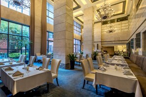 Breakfast, lunch, dinner served; local and international cuisine