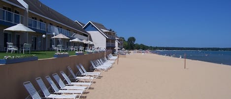 Private beach, sun-loungers, beach volleyball