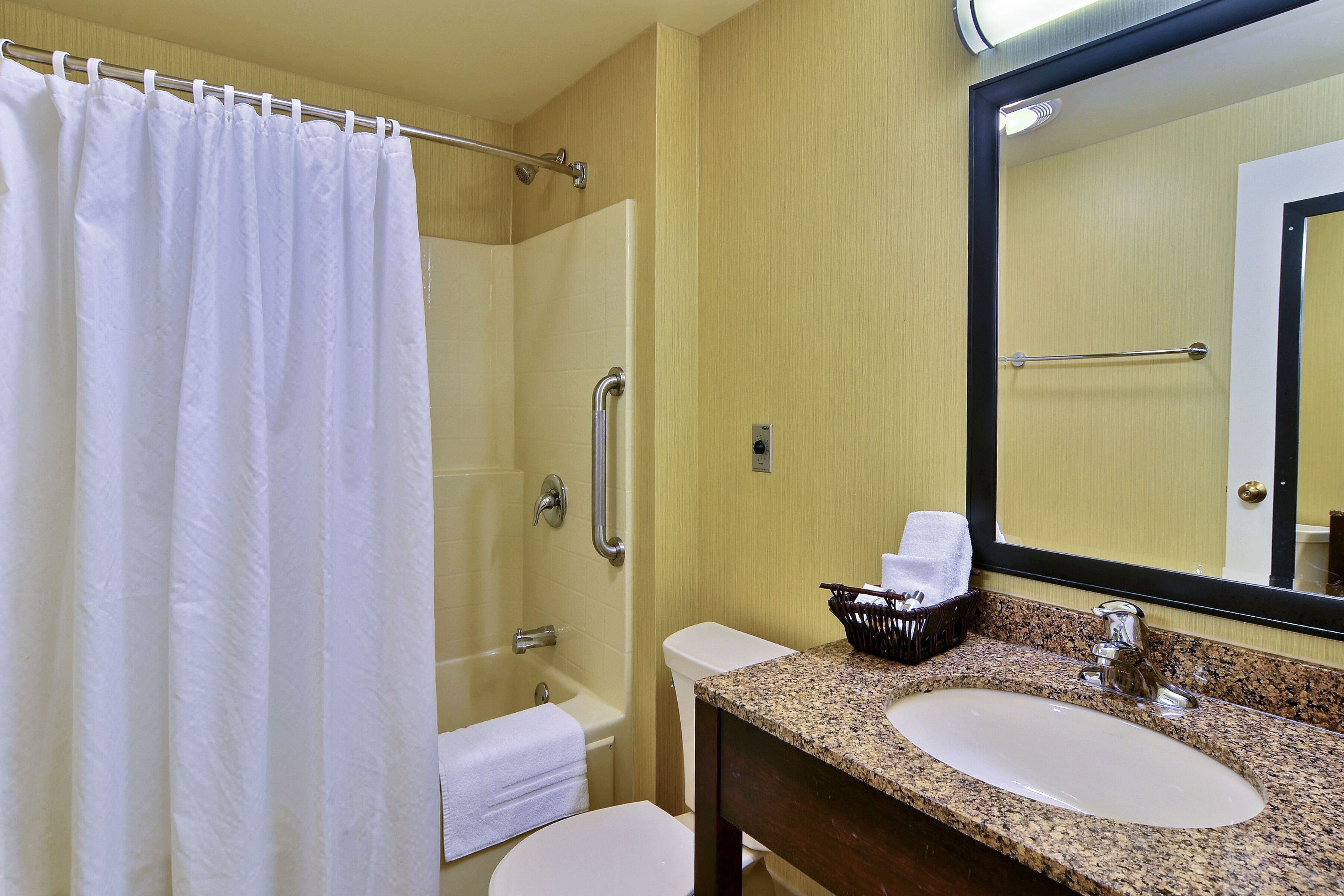combined shower/bathtub, free toiletries, hair dryer, towels