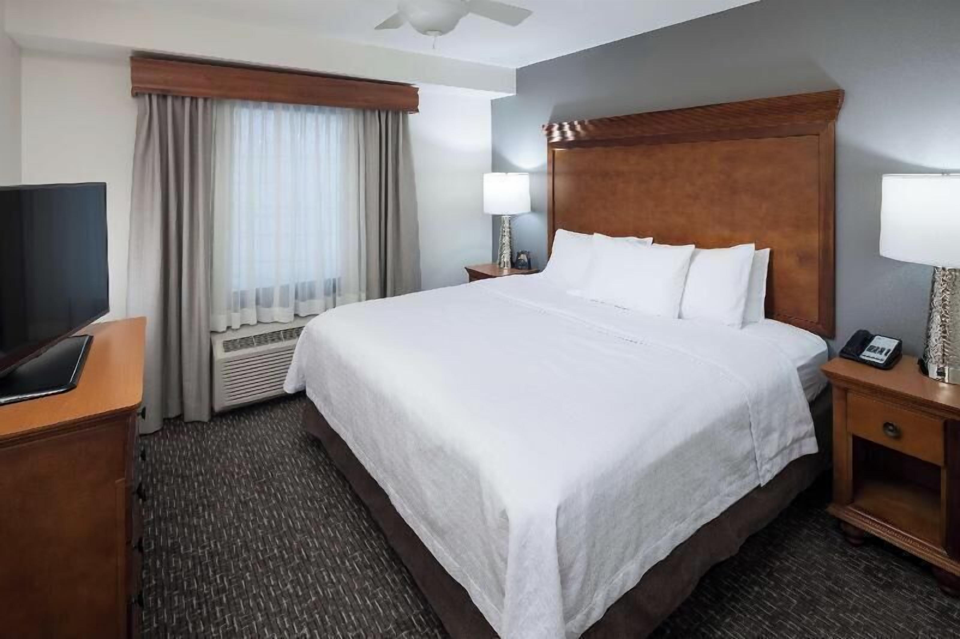 Premium bedding, blackout drapes, iron/ironing board