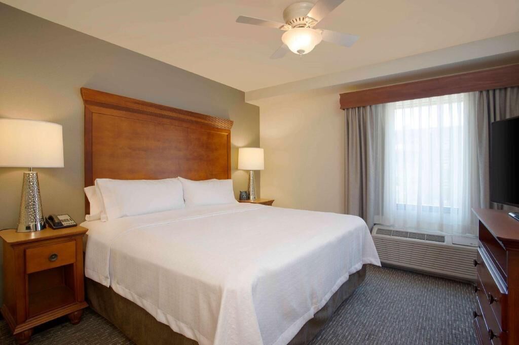 Premium bedding, blackout drapes, iron/ironing board