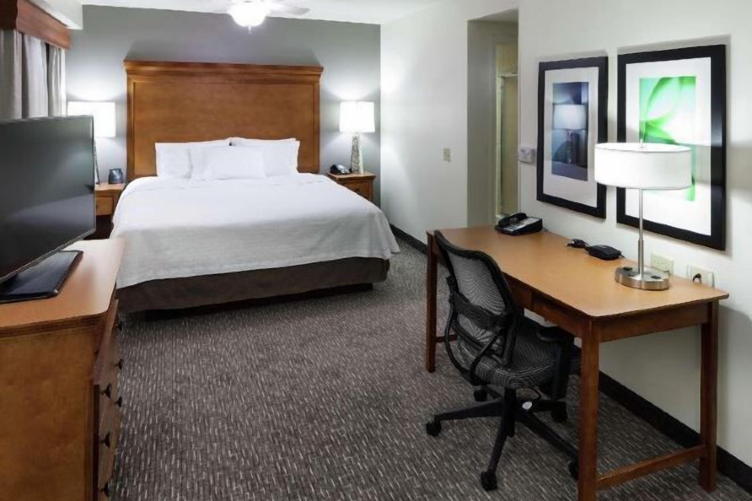 Premium bedding, blackout curtains, iron/ironing board