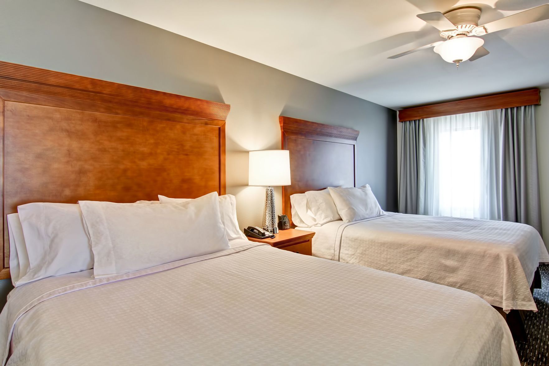 Premium bedding, blackout drapes, iron/ironing board