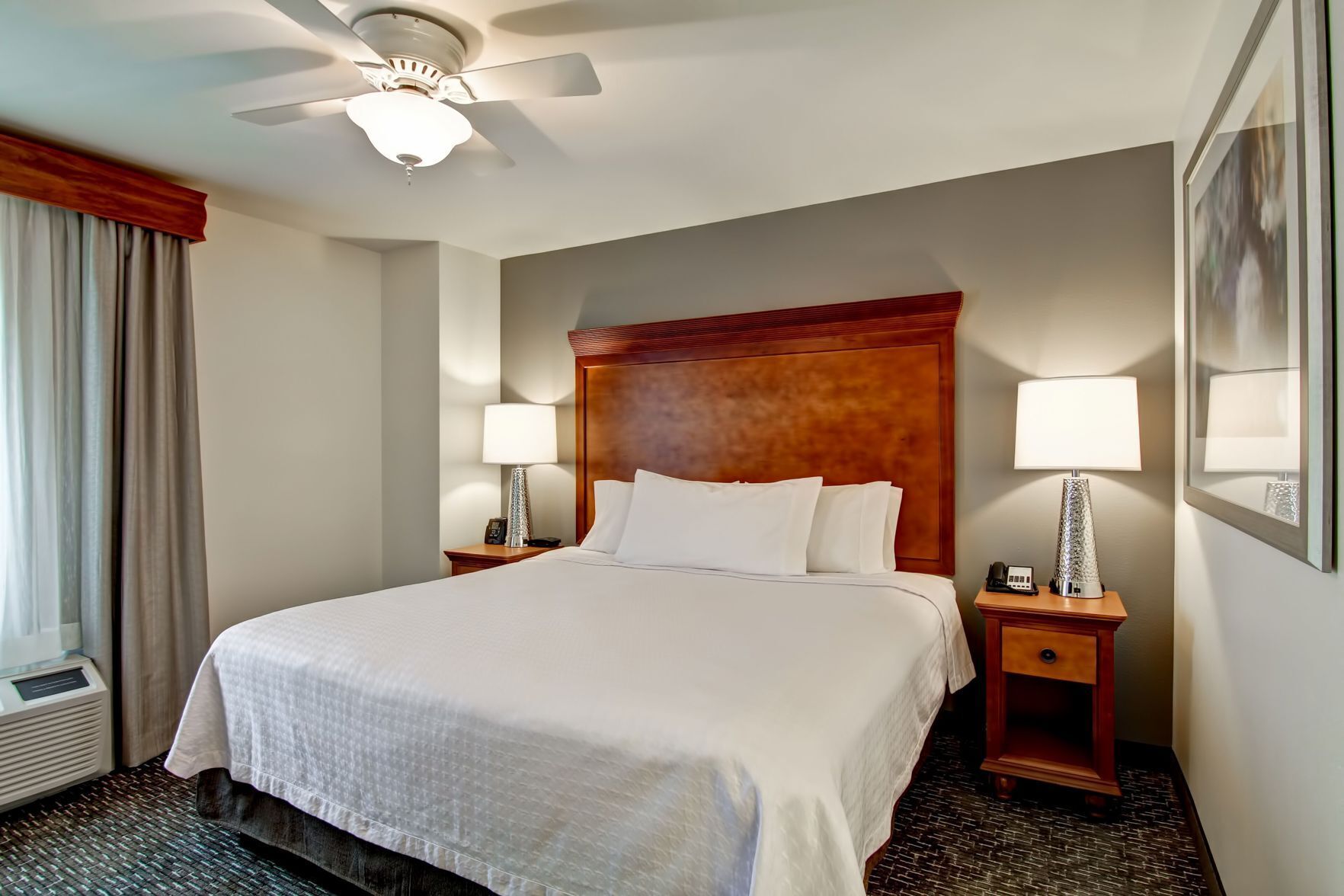 Premium bedding, blackout drapes, iron/ironing board