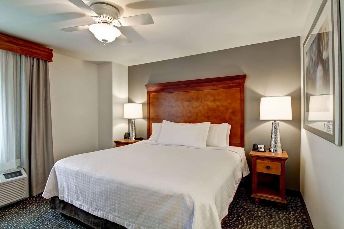 Premium bedding, blackout drapes, iron/ironing board