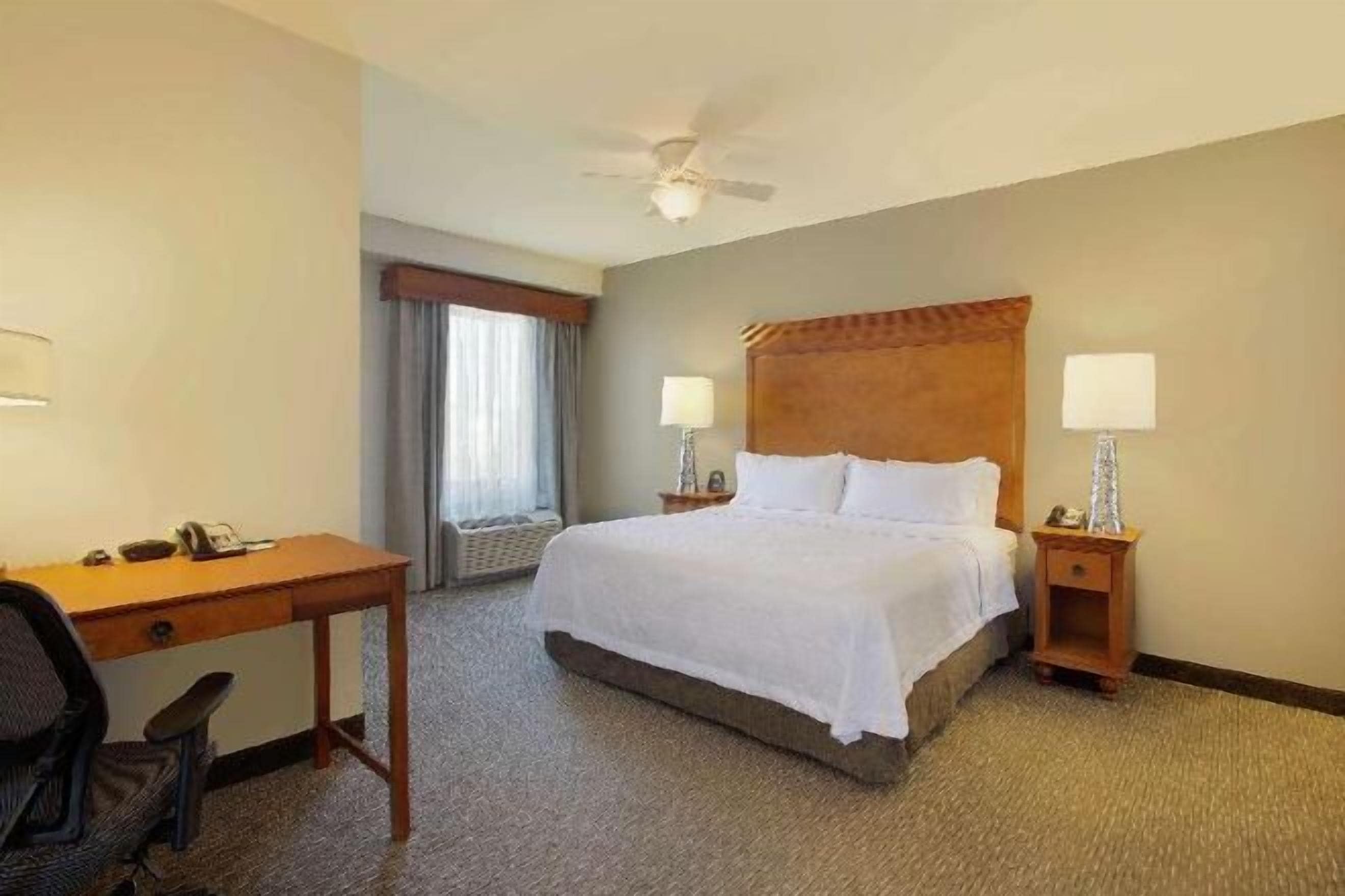 Premium bedding, blackout curtains, iron/ironing board