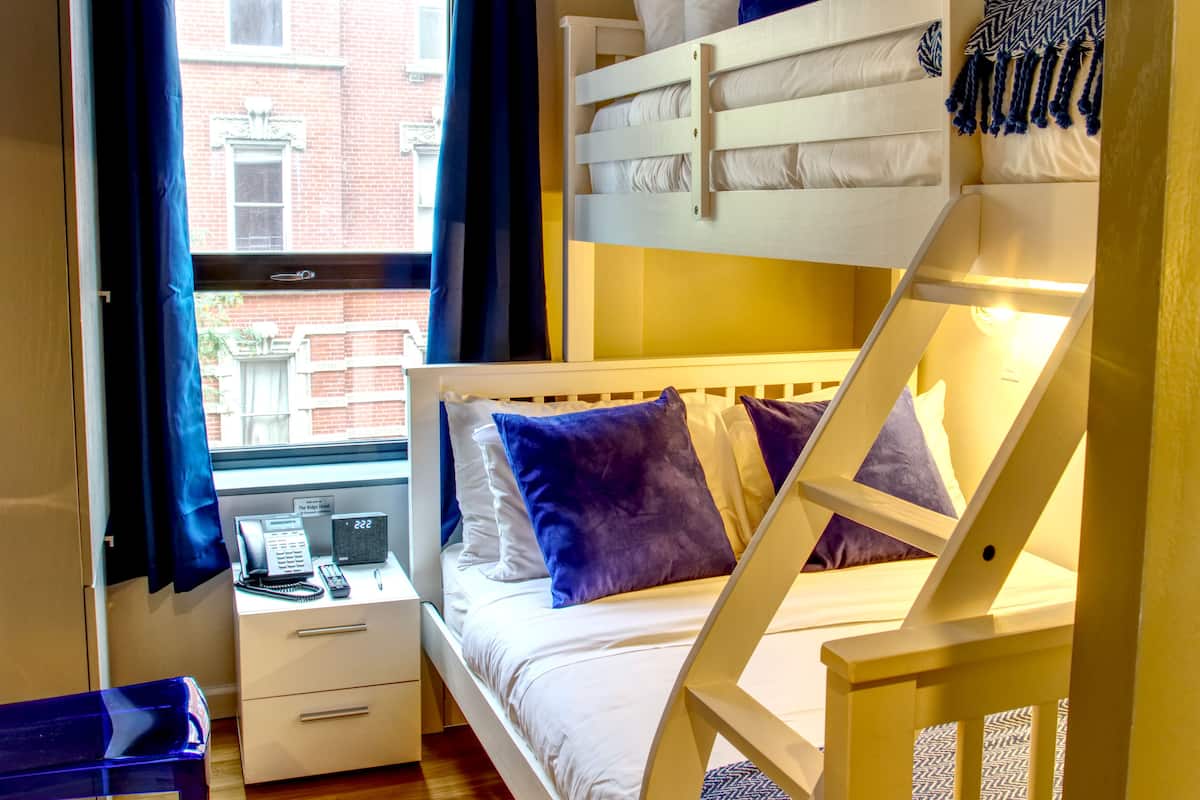 Three's Company | Premium bedding, in-room safe, soundproofing, iron/ironing board