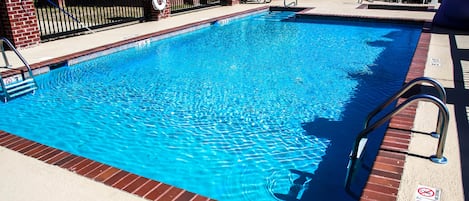 Seasonal outdoor pool, open 10 AM to 11 PM, pool loungers