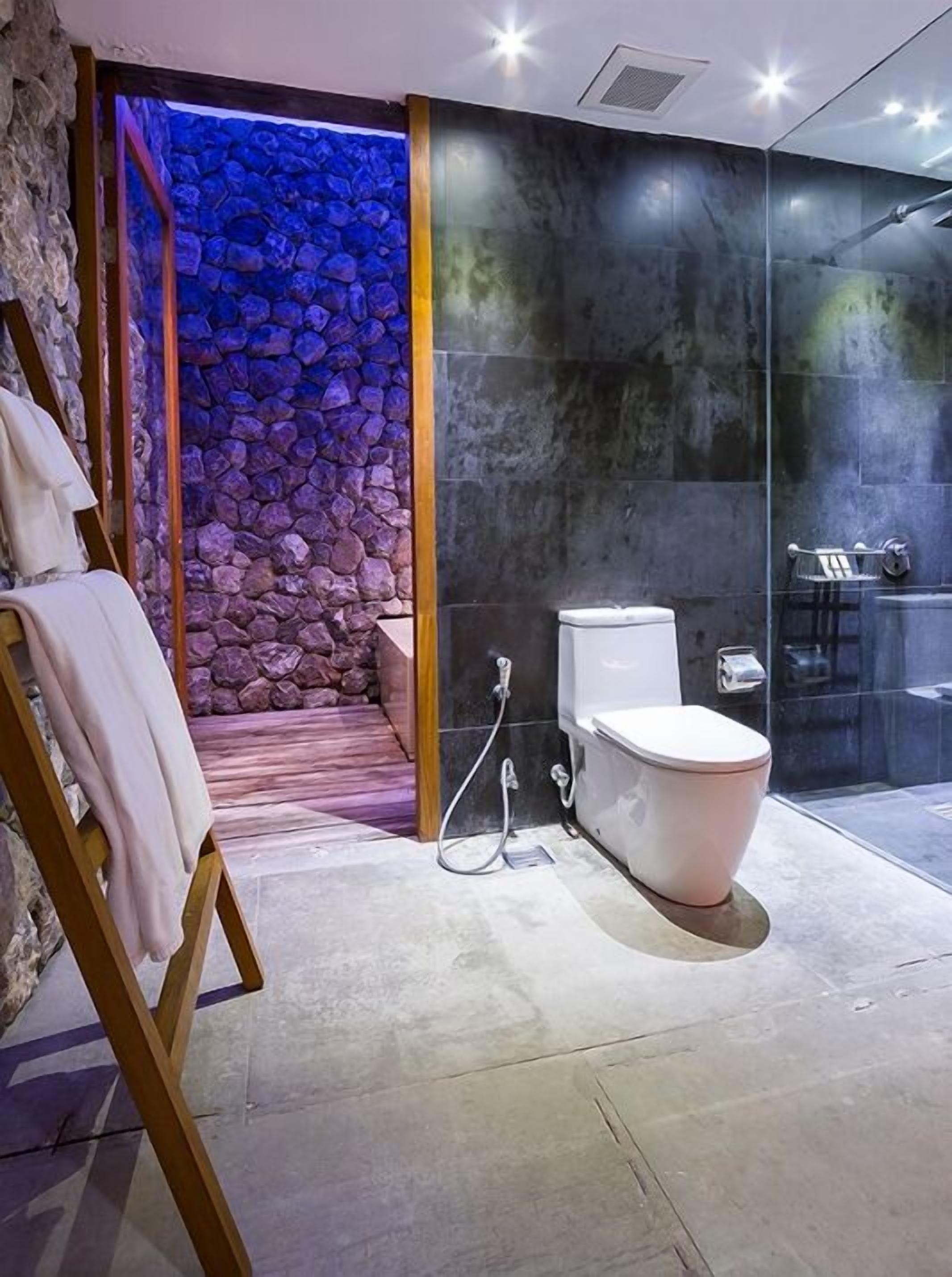 luxury oceanfront pool villa | bathroom | free toiletries, hair dryer, bathrobes, slippers