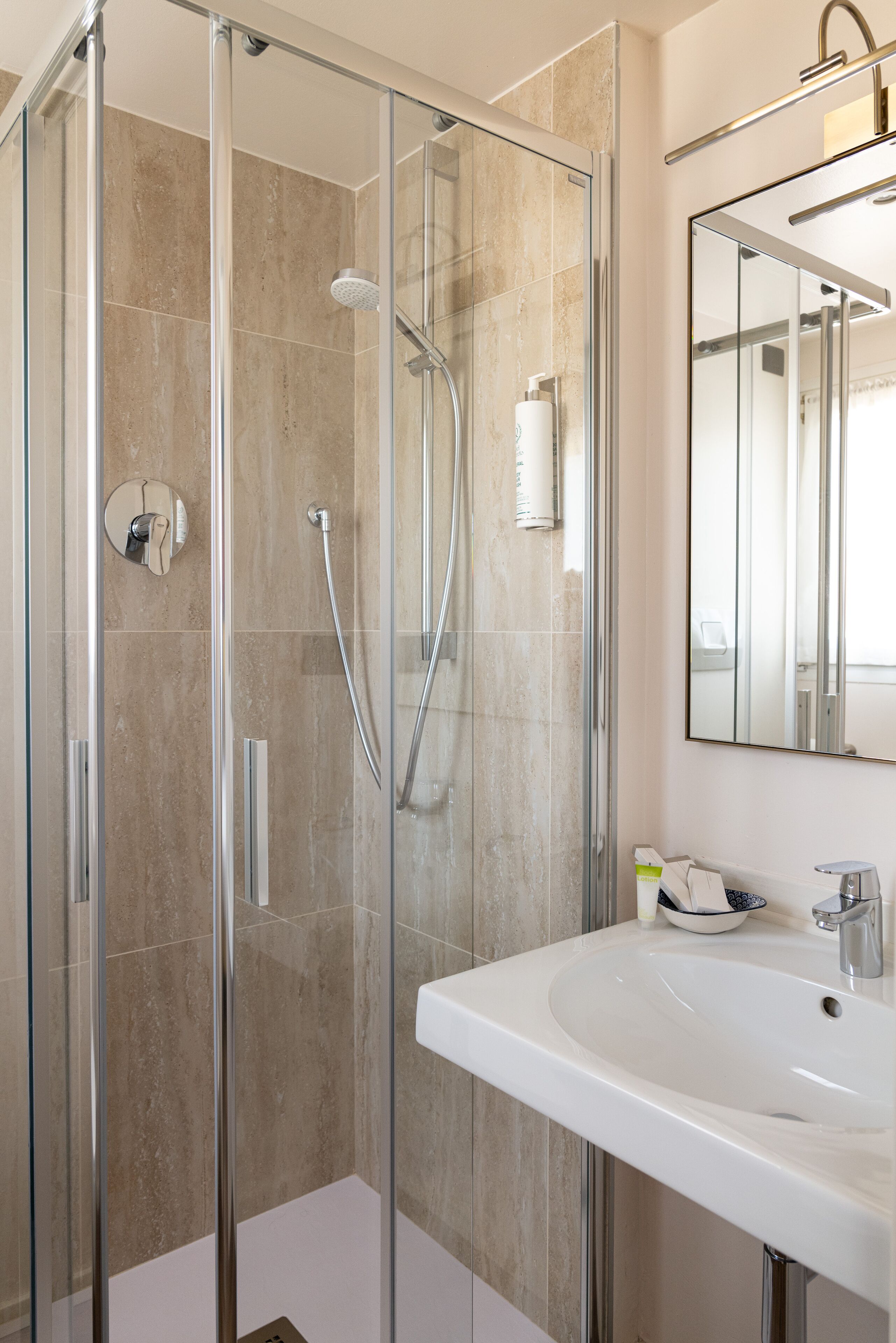basic room | bathroom | shower, rainfall showerhead, eco-friendly toiletries, hair dryer