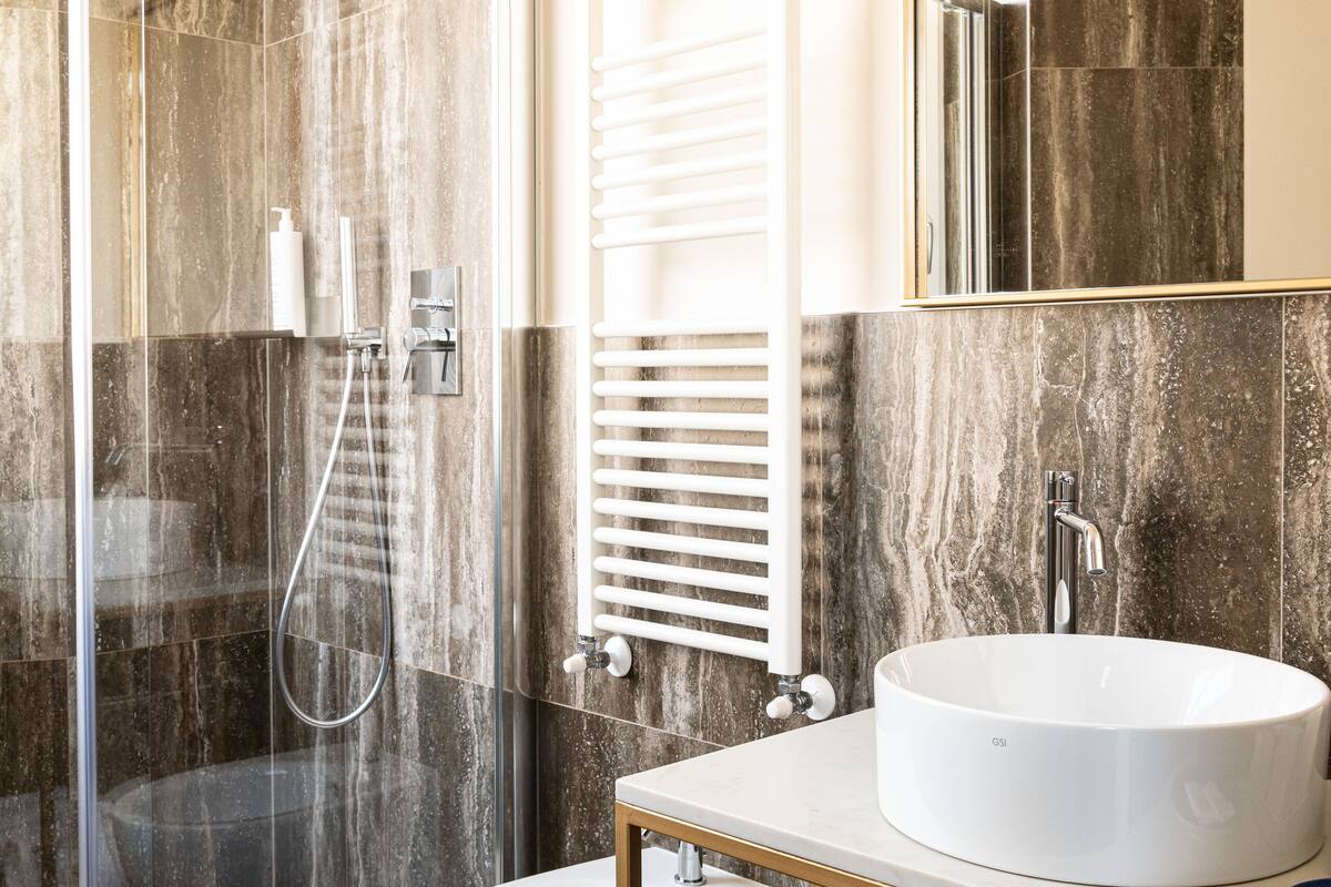 superior double or twin room | bathroom | shower, rainfall showerhead, eco-friendly toiletries, hair dryer