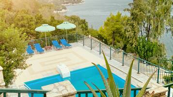 Outdoor pool, pool umbrellas, pool loungers
