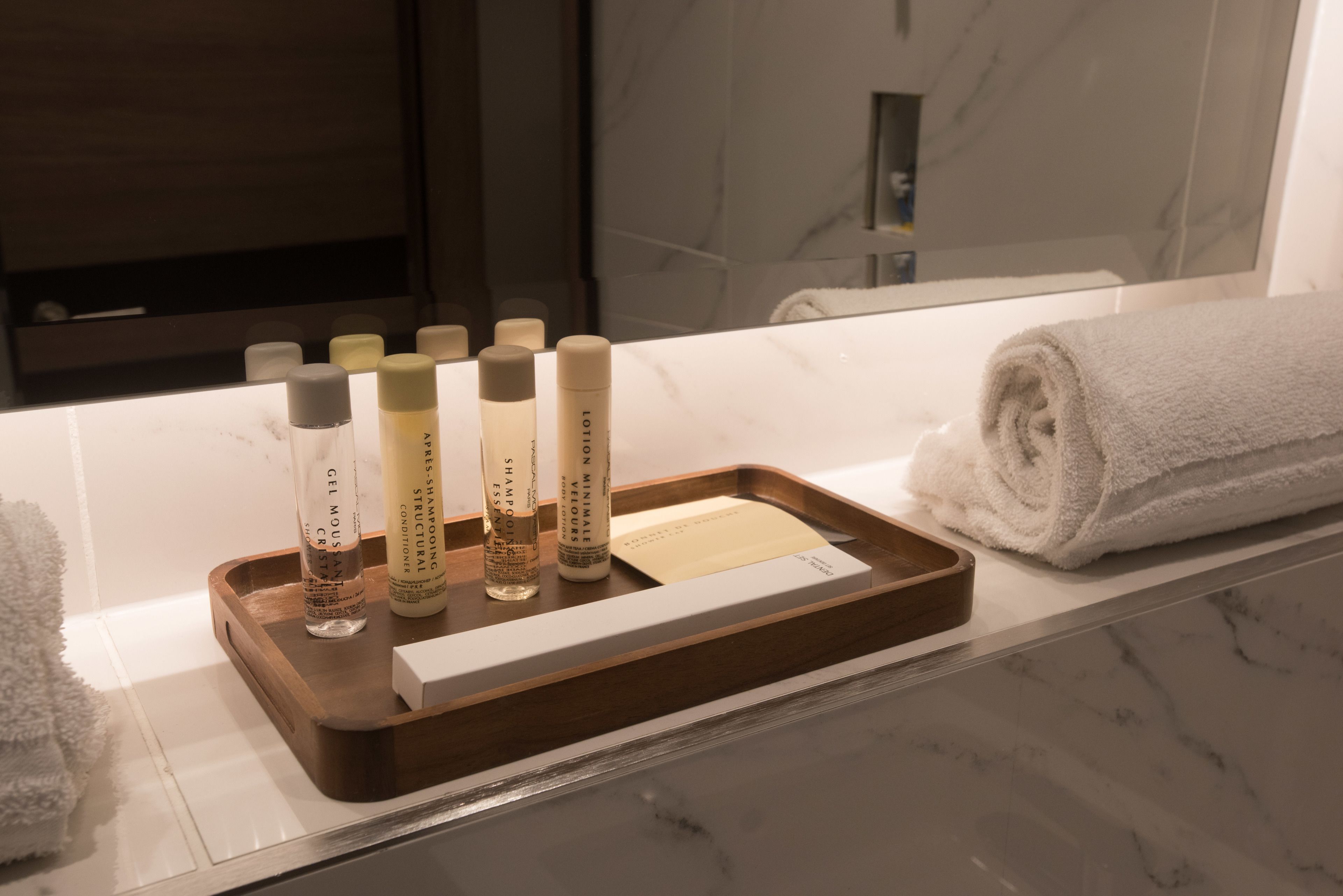 hair dryer, towels, soap, shampoo