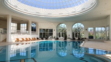 Indoor pool, outdoor pool, open 10:00 AM to 6:00 PM, pool umbrellas