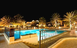 Indoor pool, outdoor pool, open 10:00 AM to 6:00 PM, pool umbrellas