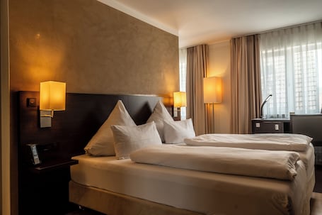 Comfort Double Room, 1 Double Bed | 1 bedroom, in-room safe, blackout drapes, iron/ironing board