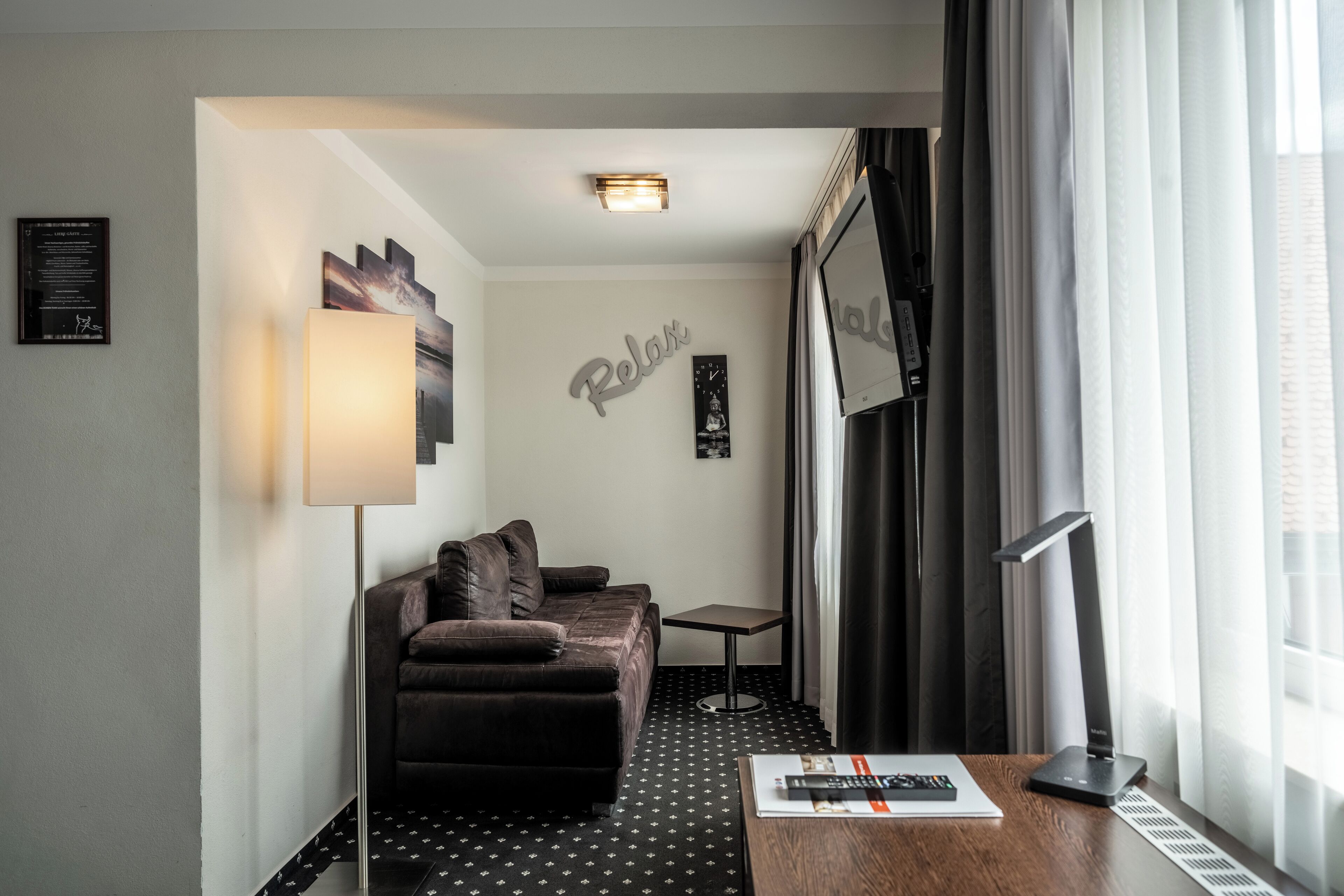 comfort double room, 1 double bed | living area | 50-inch smart tv with cable channels