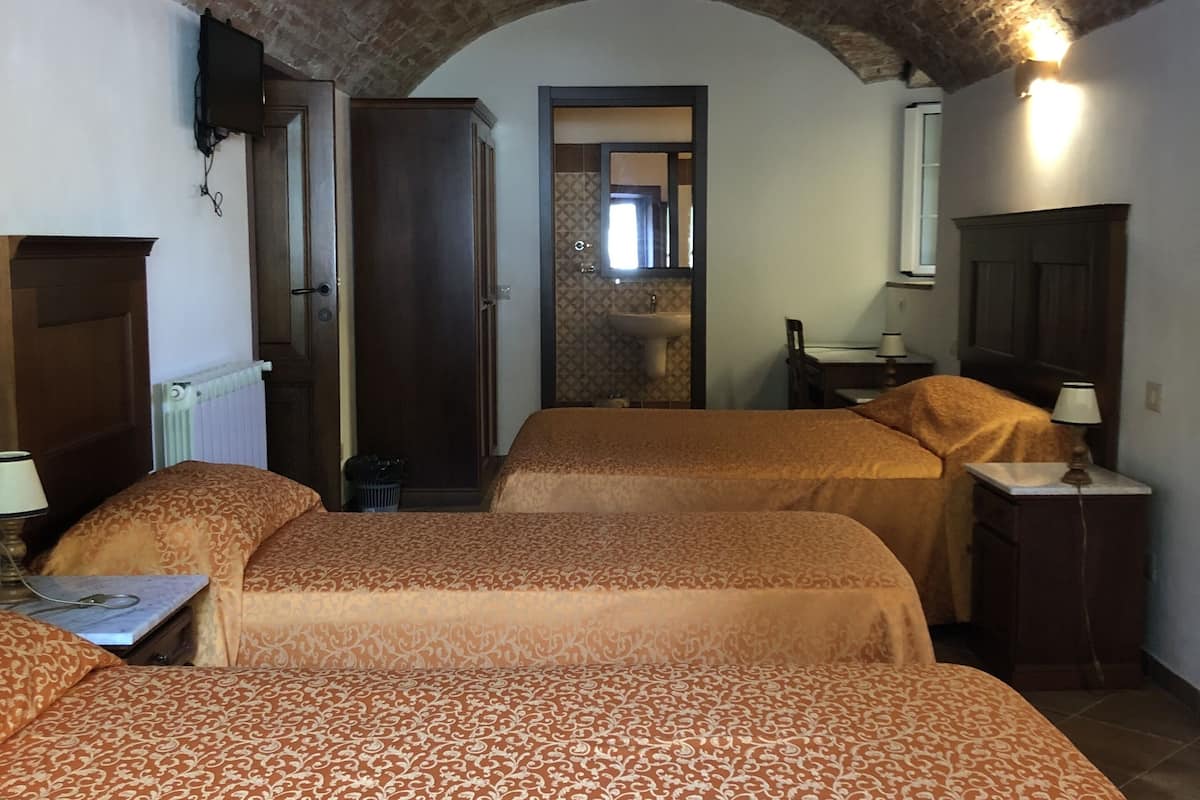 standard quadruple room | frette italian sheets, premium bedding, down duvets, select comfort beds