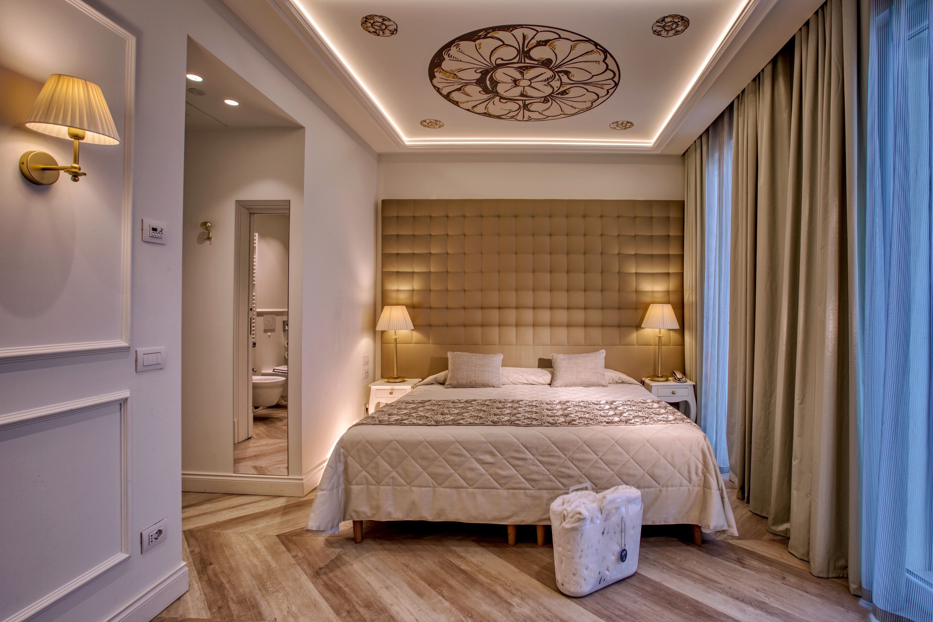 deluxe room | hypo-allergenic bedding, minibar, in-room safe, desk