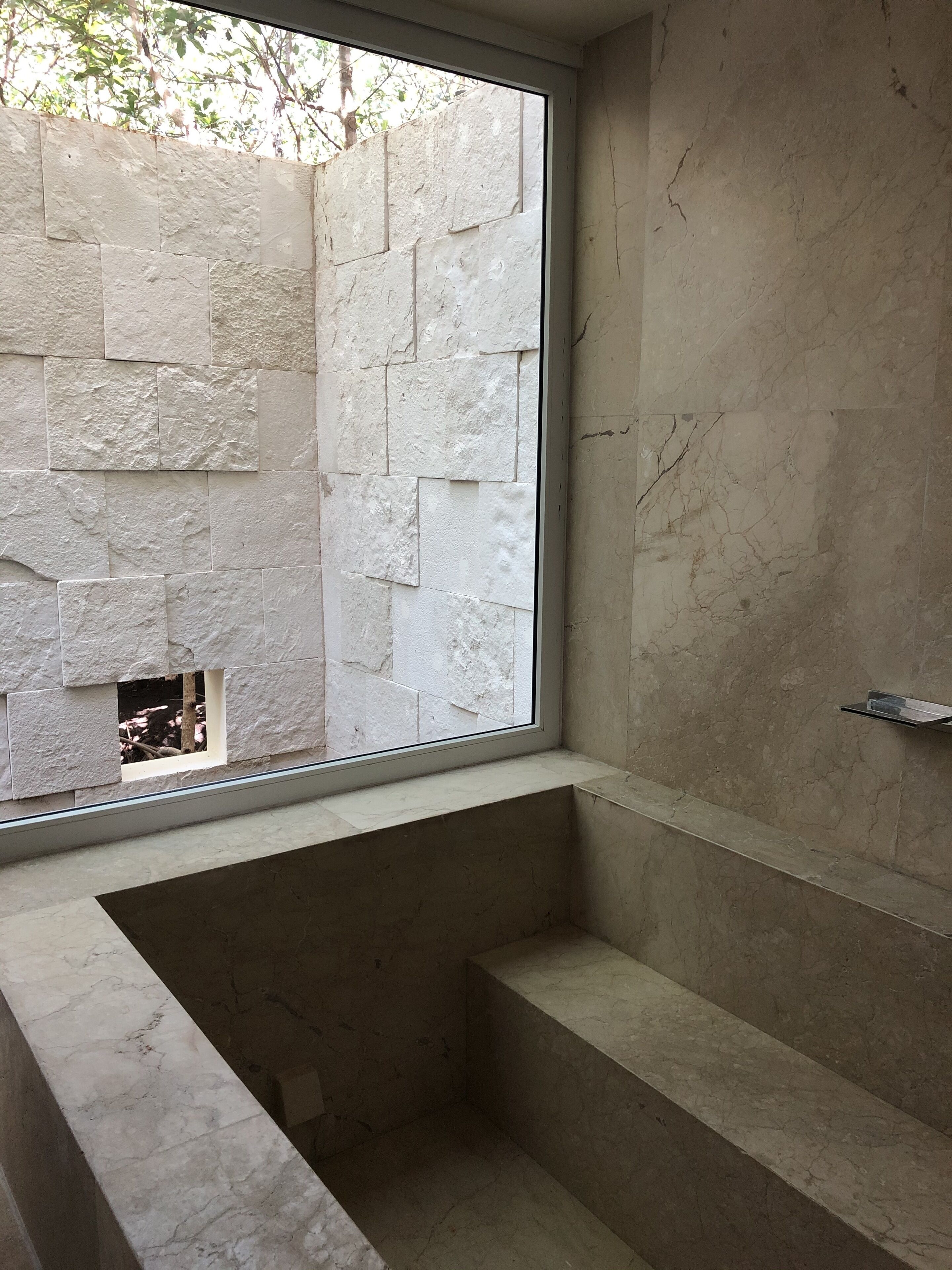 Separate bathtub and shower, rainfall showerhead, designer toiletries