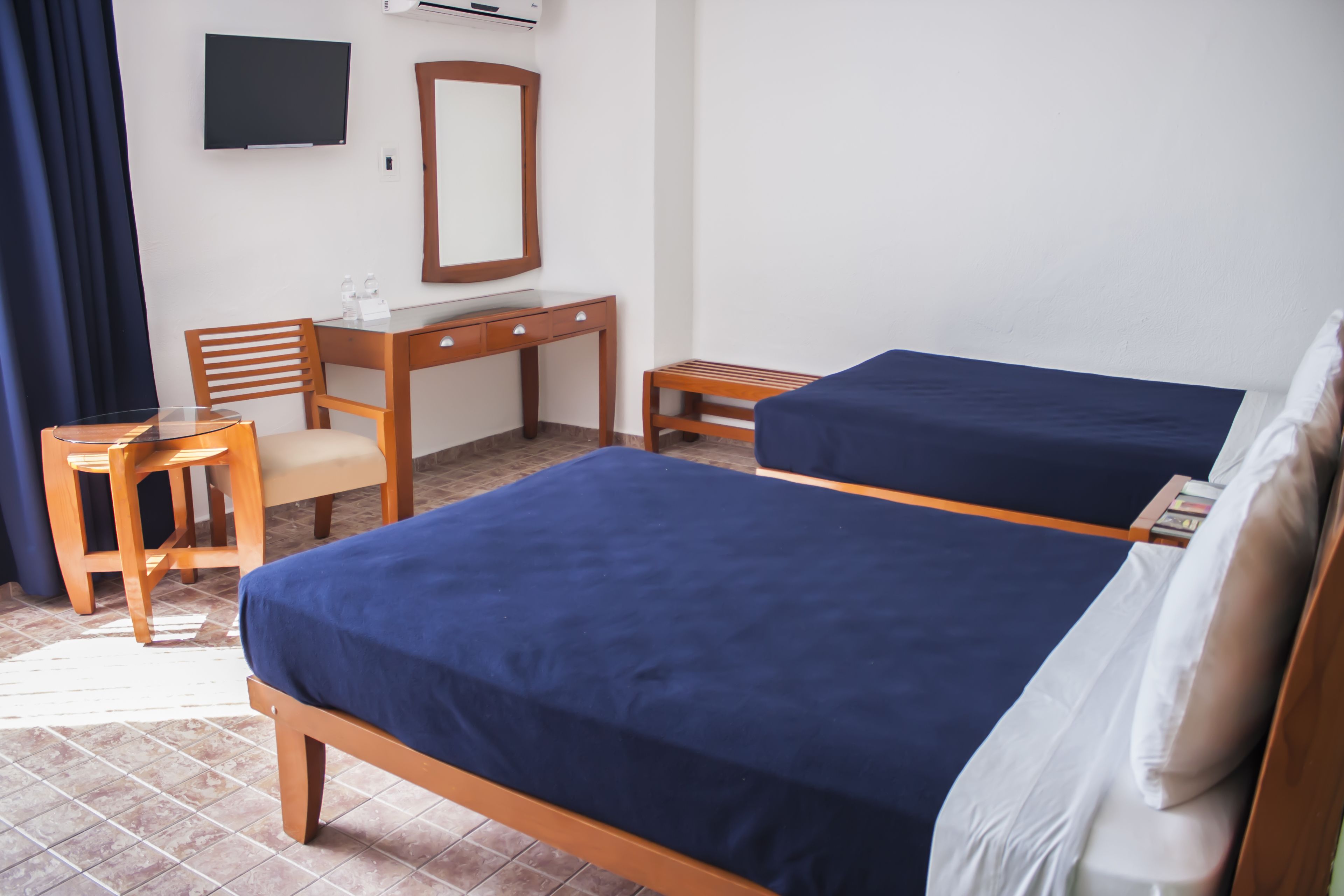 Standard Room, 2 Double Beds | In-room safe, individually decorated, individually furnished, desk