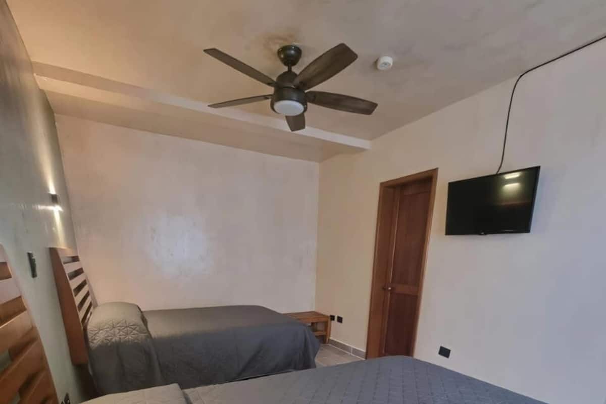 Standard Room, 2 Double Beds | In-room safe, individually decorated, individually furnished, desk