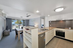 Apartment, 2 Bedrooms, Ocean View | Private kitchen | Fridge, microwave, stovetop, dishwasher - The Point Resort (Bargara)