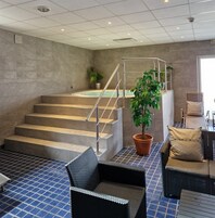 Sauna, hot tub, body treatments, hot stone massages