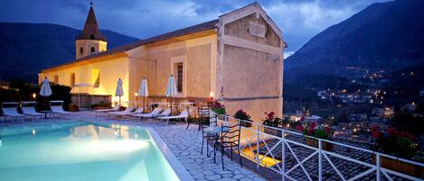 Outdoor pool, pool umbrellas, pool loungers