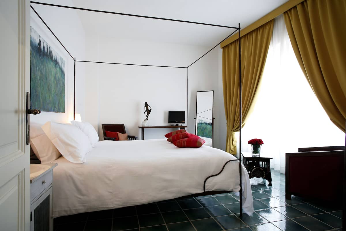 suite, garden view | 1 bedroom, frette italian sheets, premium bedding, down duvets