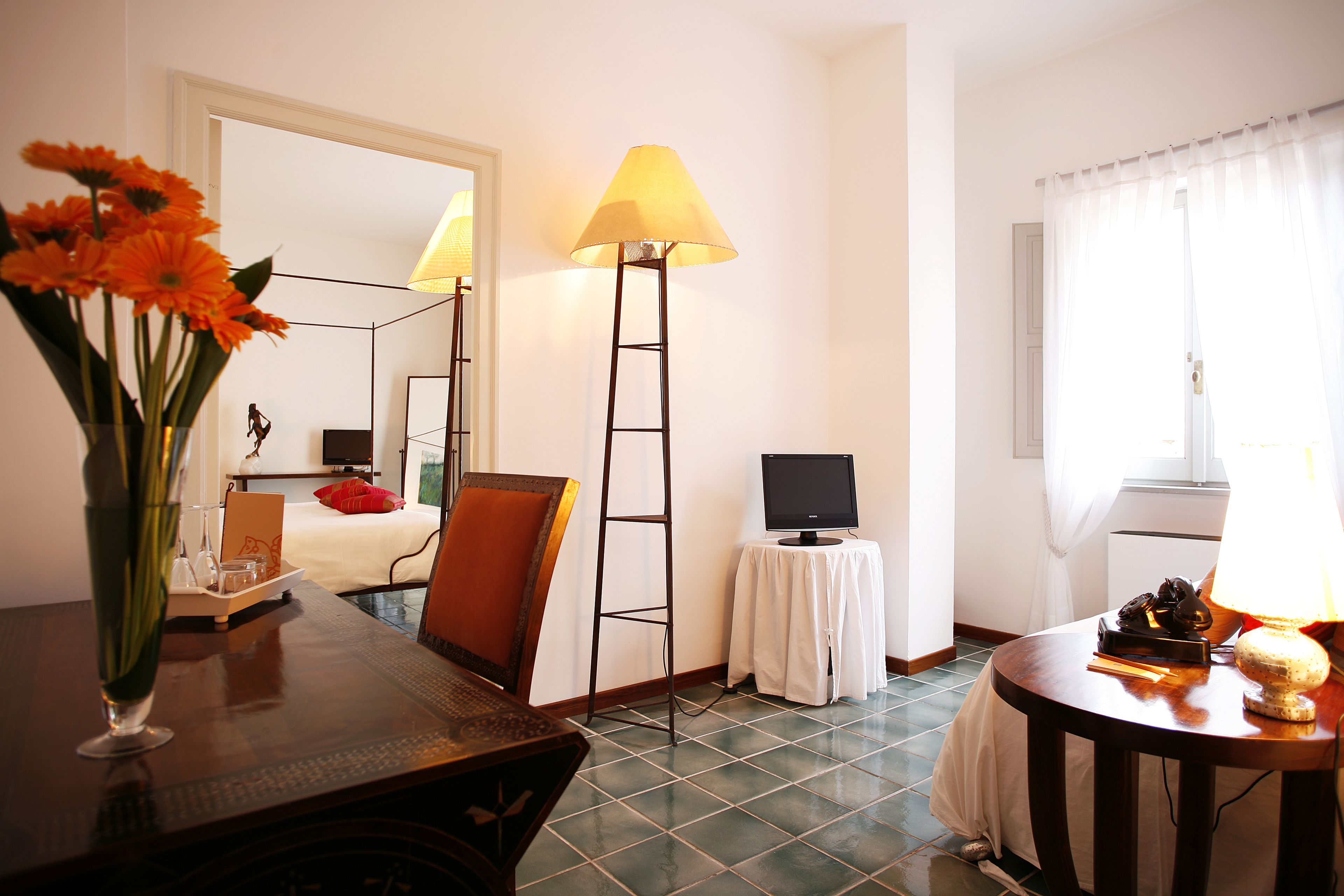 suite, garden view | living area | lcd tv, dvd player
