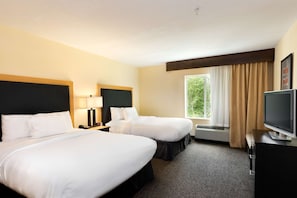 Premium bedding, pillow-top beds, in-room safe, blackout curtains