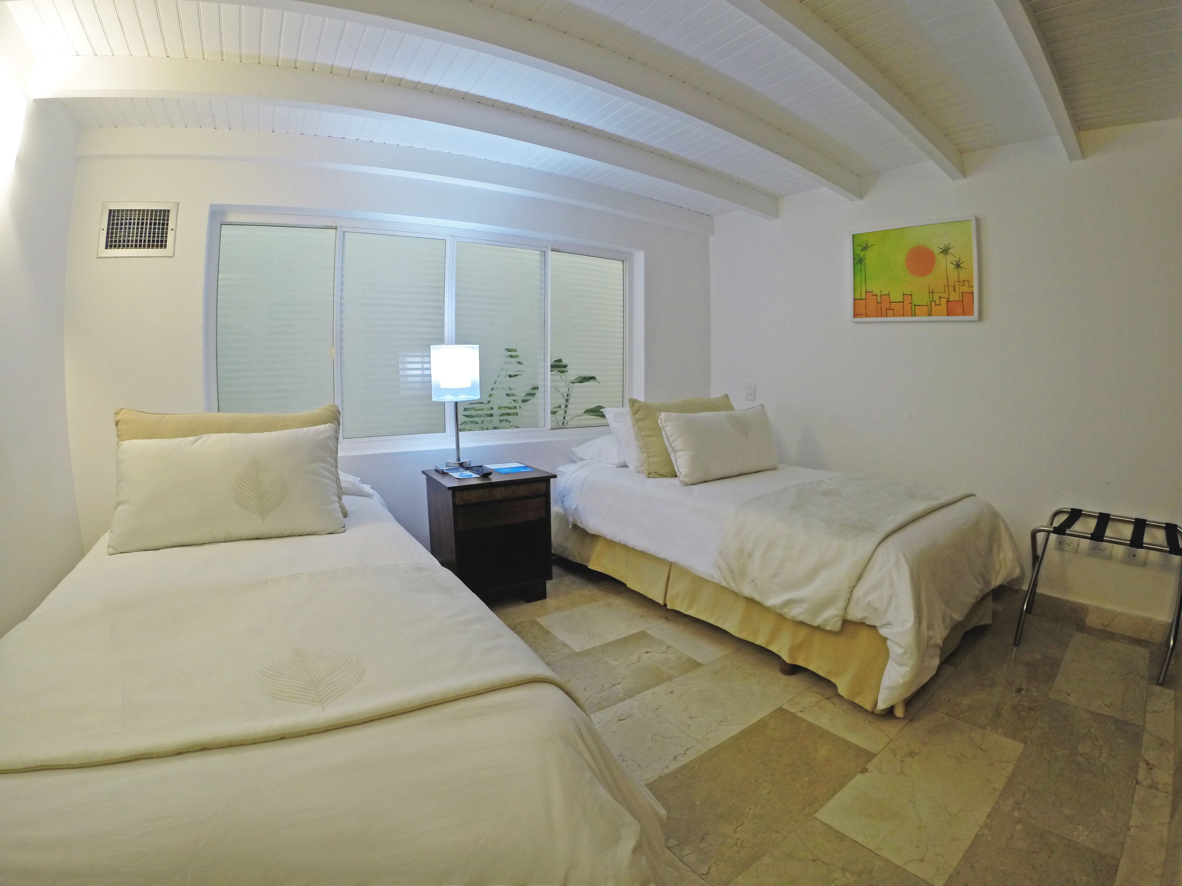 bungalow | premium bedding, down duvets, pillow-top beds, minibar