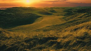A landscape with rolling hills and a sunset. - Downhill Inn (Ballina)