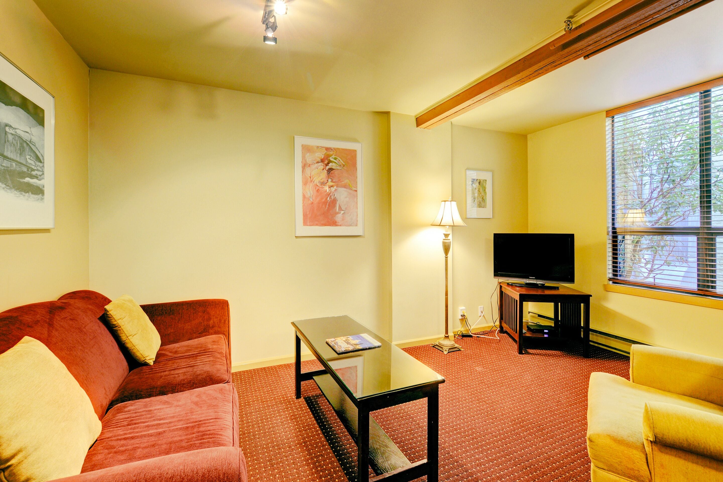 standard suite with stairs | living room | 42-inch tv with digital channels