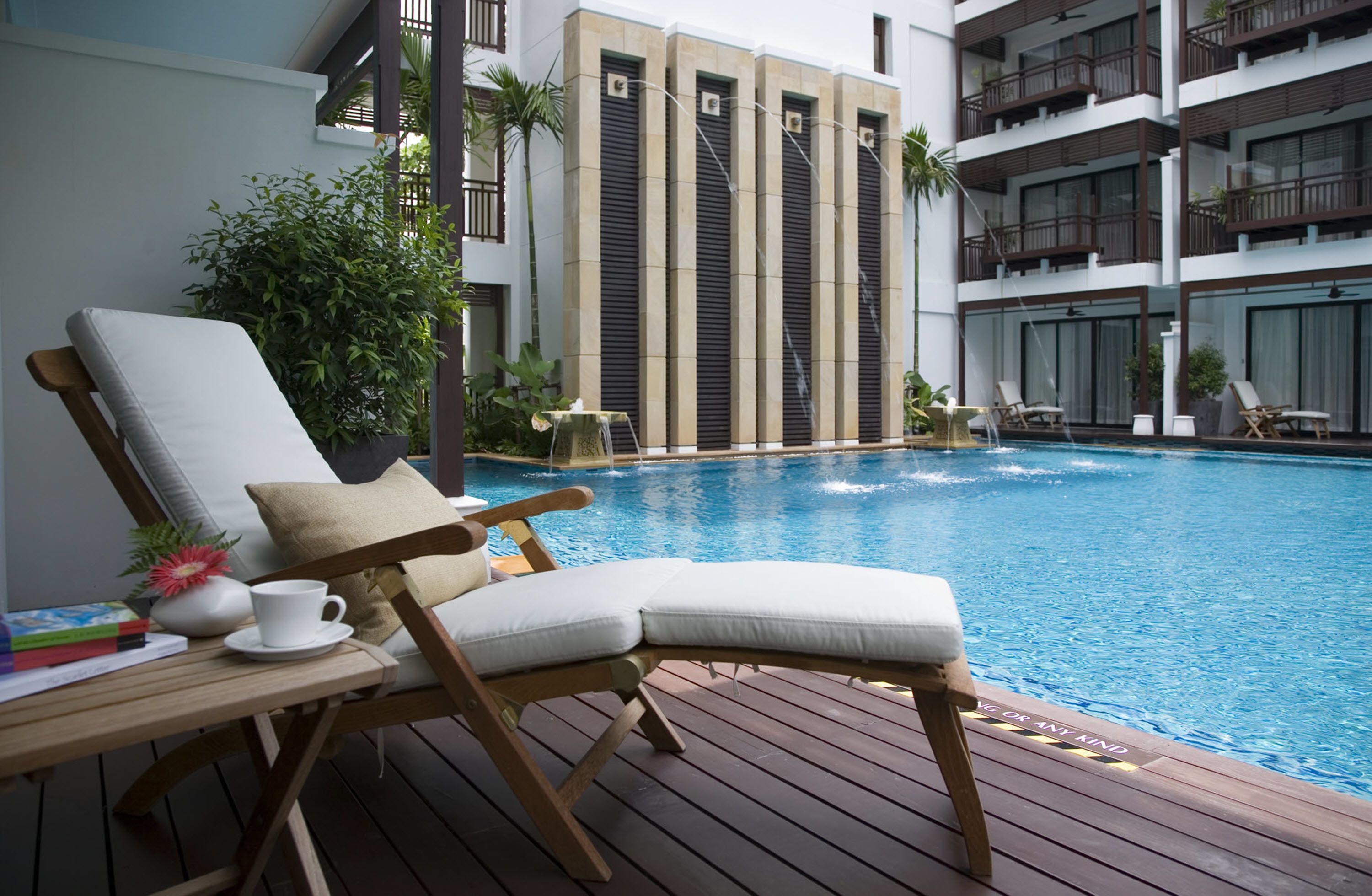 deluxe room, 1 double or 2 single beds, pool access, pool view | balcony