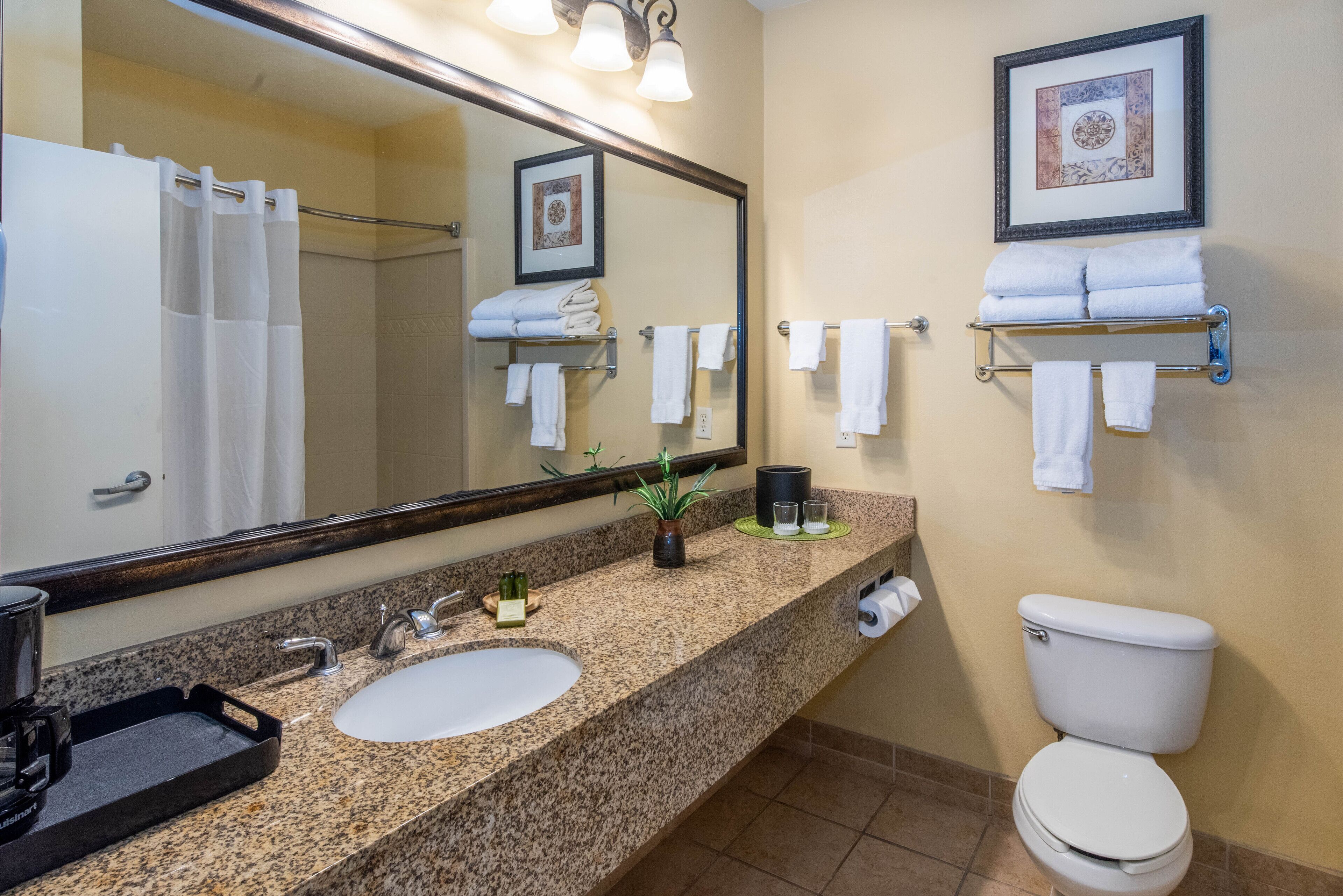 deluxe room, 2 queen beds | bathroom | combined shower/bathtub, rainfall showerhead, free toiletries